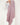 Femme de profil portant un hijab dégradé Mauve Doux de la collection Mimi Kiseki, illustrant l’élégance sobre et la fluidité d’un tissu premium, parfait pour une tenue modeste et raffinée.