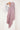 Femme de profil portant un hijab dégradé Mauve Doux de la collection Mimi Kiseki, illustrant l’élégance sobre et la fluidité d’un tissu premium, parfait pour une tenue modeste et raffinée.